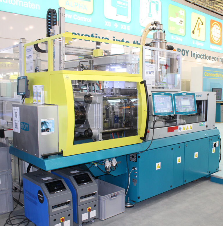 Two Injection Moulding Machines at Plast Milan: a Small Giant and a Big Dwarf